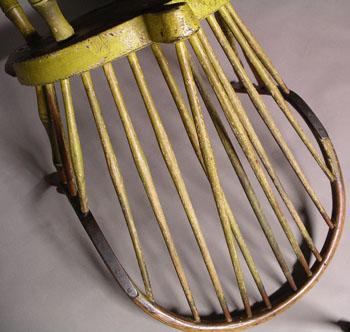 A Brace Back Continuous Arm Windsor Chair in Old Yellow Paint